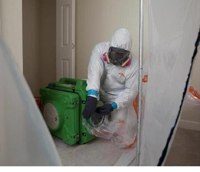 Staff in PPE gear